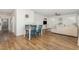 Dining area is central between the living room, entryway, and kitchen in an open-concept layout at 19 Cecina Ct, Clayton, NC 27527