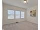 Bedroom featuring carpeted floors, a large window, and neutral paint, creating a bright and inviting atmosphere at 1904 Birdhouse Ln, Wake Forest, NC 27587