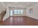 Bright room featuring backyard access, neutral walls, and durable flooring, ideal for flexible living spaces at 1904 Birdhouse Ln, Wake Forest, NC 27587
