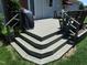 Outdoor deck with stairs and a grill, perfect for entertaining at 2000 Howson Rd, Raleigh, NC 27603