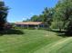 Charming one story home with inviting front porch and well-manicured lawn at 2000 Howson Rd, Raleigh, NC 27603