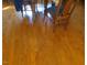 Beautiful hardwood floors in dining room with table and chairs at 2000 Howson Rd, Raleigh, NC 27603