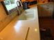 A close up of the kitchen sink that features a window and a large basin at 2000 Howson Rd, Raleigh, NC 27603
