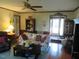 Cozy living room with a comfortable sofa and a ceiling fan at 2000 Howson Rd, Raleigh, NC 27603