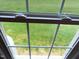 Window view overlooking a beautiful, well-maintained green lawn at 2000 Howson Rd, Raleigh, NC 27603