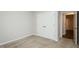 Bedroom with carpet floors, closet, and neutral walls at 201 E Laramie Dr, Mebane, NC 27302