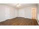 Spacious bedroom with hardwood floors, walk-in closet, and ensuite bathroom at 201 E Laramie Dr, Mebane, NC 27302