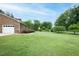 Spacious home with well manicured lawn and landscaping at 201 E Laramie Dr, Mebane, NC 27302
