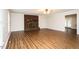 Bright living room with hardwood floors, brick fireplace and windows with lots of natural light at 201 E Laramie Dr, Mebane, NC 27302