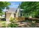 Back of the home showing a small deck and back yard area at 203 Needle Park Dr, Cary, NC 27513