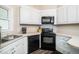 Functional kitchen featuring stainless appliances and ample counter space for cooking at 203 Needle Park Dr, Cary, NC 27513