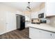 Spacious kitchen featuring updated appliances, ample counter space, and modern design at 203 Needle Park Dr, Cary, NC 27513