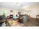 Inviting living room features a cozy fireplace, vaulted ceilings, and colorful rug at 203 Needle Park Dr, Cary, NC 27513