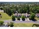 Aerial view of the home showcasing its location in a tree-lined neighborhood at 205 Hammond Wood Pl, Morrisville, NC 27560