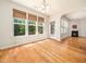 Breakfast nook with a light fixture, large windows and backyard view at 205 Hammond Wood Pl, Morrisville, NC 27560