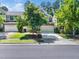 Well-maintained home boasts a stone facade, two-car garage, and lush green lawn at 205 Hammond Wood Pl, Morrisville, NC 27560