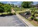 Community playground and walking path offers outdoor recreation and enjoyment at 205 Hammond Wood Pl, Morrisville, NC 27560