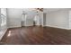 Upstairs room featuring a ceiling fan and wood floors at 206 Kettlebridge Dr, Cary, NC 27511