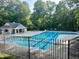 Community pool area with a pool, lounge chairs, and gazebo for residents at 206 Kettlebridge Dr, Cary, NC 27511
