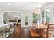 Inviting dining area connecting the kitchen, living room, and backyard patio, perfect for entertaining at 206 Kettlebridge Dr, Cary, NC 27511
