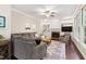 Inviting living room features a fireplace, built-in shelving, and comfortable seating for Gathering and guests at 206 Kettlebridge Dr, Cary, NC 27511