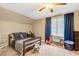 Well-lit bedroom with a ceiling fan, neutral walls, and a comfortable bed at 2062 Montgomery Dr, Franklinton, NC 27525