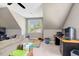 Spacious and bright bonus room features carpeted floors and natural lighting at 2062 Montgomery Dr, Franklinton, NC 27525