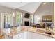 Inviting living room offering a vaulted ceiling, fireplace, and an open view to the gourmet kitchen at 2062 Montgomery Dr, Franklinton, NC 27525