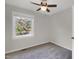 Bedroom featuring neutral walls, carpet, ceiling fan and a window with lake view at 207 Mcleod Dr, Sanford, NC 27330