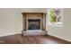 Close-up of the living room fireplace with decorative mantle at 207 Mcleod Dr, Sanford, NC 27330