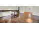 Spacious living room featuring hardwood floors and a built-in desk, perfect for work or study at 207 Mcleod Dr, Sanford, NC 27330