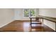 Bright living area with hardwood floors, a built-in desk, and ample natural light at 207 Mcleod Dr, Sanford, NC 27330