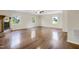 Expansive living room with hardwood floors, fireplace, and natural light at 207 Mcleod Dr, Sanford, NC 27330