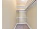 Walk-in closet with shelving and rod for ample storage space at 207 N Hopkins Ave, Spring Hope, NC 27882