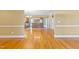 Spacious dining and kitchen area with hardwood floors and ample natural light at 207 N Hopkins Ave, Spring Hope, NC 27882