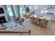 Open-concept living space showcases a fireplace, kitchen, and dining area at 241 Tidal Pool Way, Cary, NC 27519