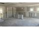 Unfinished room featuring drywall, concrete floor, and multiple outlets at 241 Tidal Pool Way, Cary, NC 27519