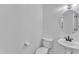 Clean half bath featuring white fixtures, ideal for guests at 2513 Myrtle Ln, Hillsborough, NC 27278