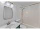 Bathroom features a vanity with brushed nickel faucet and a shower-tub combination at 2513 Myrtle Ln, Hillsborough, NC 27278