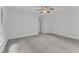 Neutral bedroom with carpet, ceiling fan, and a closet door at 2513 Myrtle Ln, Hillsborough, NC 27278