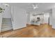 Open-concept living space featuring bamboo flooring and white walls at 2513 Myrtle Ln, Hillsborough, NC 27278
