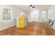 Spacious bedroom with hardwood floors, large windows, ceiling fan and colorful play tent at 2515 W Club Blvd, Durham, NC 27705
