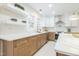 Bright kitchen featuring stainless steel appliances, subway tile backsplash, and white countertops at 2515 W Club Blvd, Durham, NC 27705