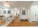 Bright and spacious living room with hardwood floors, modern lighting, and stylish decor for comfortable living at 2515 W Club Blvd, Durham, NC 27705