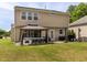 The spacious backyard features a gazebo, a grill, and plenty of room to enjoy the outdoors at 2605 Mcdougall Dr, Burlington, NC 27217