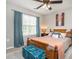 Cozy bedroom with a light-filled window, comfortable bed, and peaceful décor at 2605 Mcdougall Dr, Burlington, NC 27217