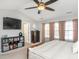 Cozy bedroom with large bed, and media center making it a relaxing space to unwind at 2605 Mcdougall Dr, Burlington, NC 27217