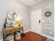 Inviting entryway with stylish decor, wood floors, and a welcoming atmosphere with decor and accents at 2605 Mcdougall Dr, Burlington, NC 27217