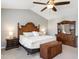 Relaxing bedroom featuring a large bed, matching dresser and bedside tables, plus natural light at 2605 Mcdougall Dr, Burlington, NC 27217