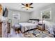 Comfortable bedroom with hardwood floors, ceiling fan, and great natural light at 2824 Blanche Dr, Burlington, NC 27215
